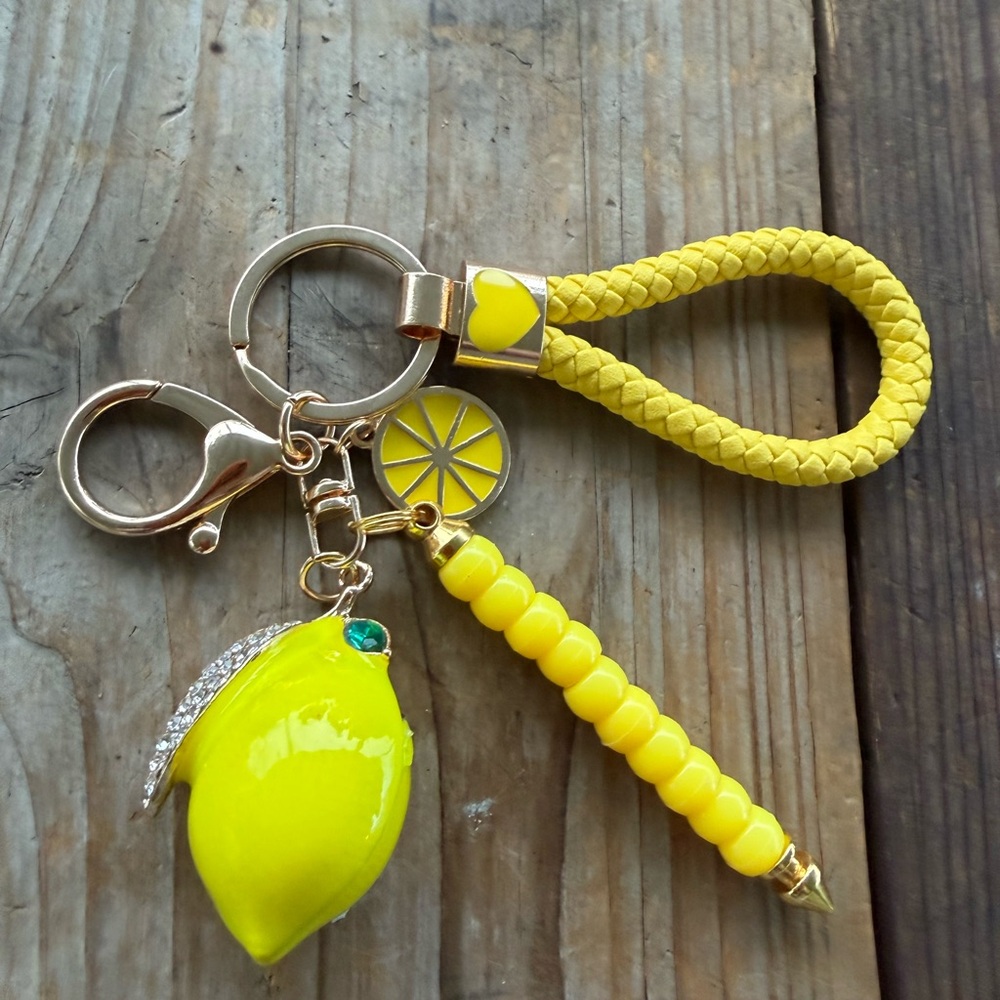 Lemon keychain handmade with all yellow beads on silver bar . $20